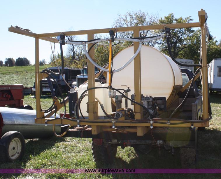 image for item 4650 1984 Chevrolet Silverado truck with spray rig