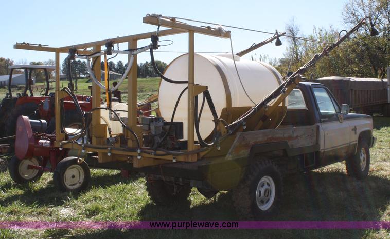 image for item 4650 1984 Chevrolet Silverado truck with spray rig
