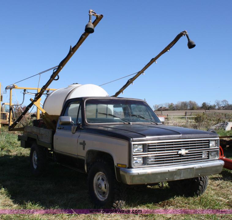 image for item 4650 1984 Chevrolet Silverado truck with spray rig