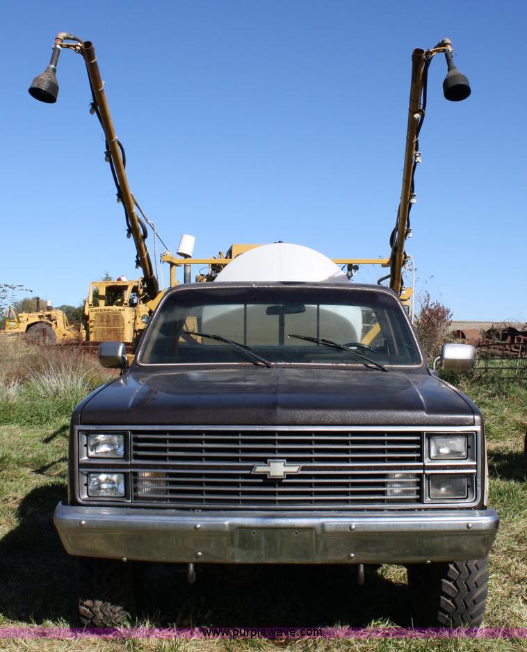image for item 4650 1984 Chevrolet Silverado truck with spray rig