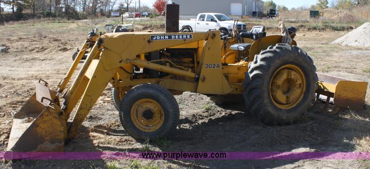 image for item 4706 1981 John Deere 302A tractor with loader