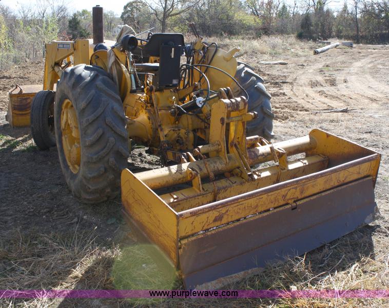 image for item 4706 1981 John Deere 302A tractor with loader