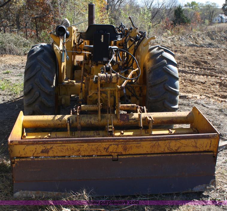 image for item 4706 1981 John Deere 302A tractor with loader