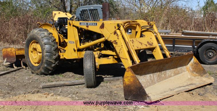 image for item 4706 1981 John Deere 302A tractor with loader