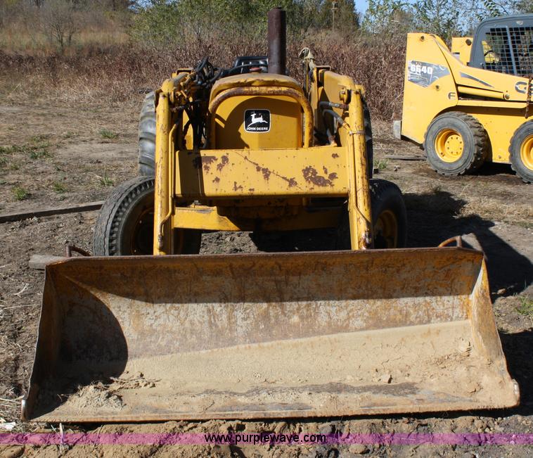image for item 4706 1981 John Deere 302A tractor with loader
