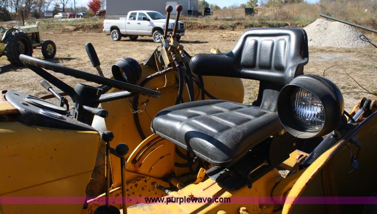 image for item 4706 1981 John Deere 302A tractor with loader