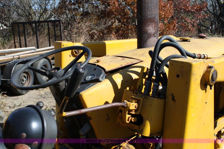 image for item 4706 1981 John Deere 302A tractor with loader