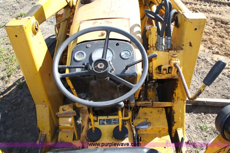 image for item 4706 1981 John Deere 302A tractor with loader