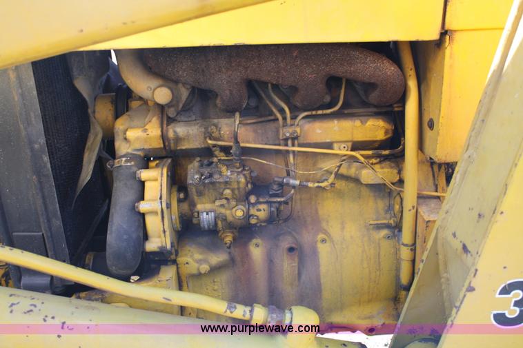 image for item 4706 1981 John Deere 302A tractor with loader