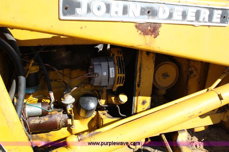 image for item 4706 1981 John Deere 302A tractor with loader