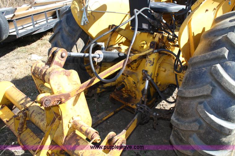 image for item 4706 1981 John Deere 302A tractor with loader