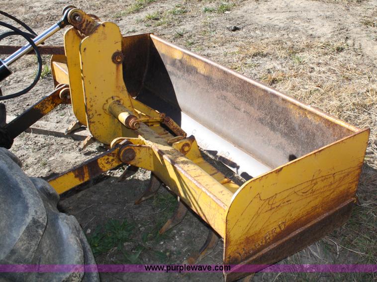 image for item 4706 1981 John Deere 302A tractor with loader