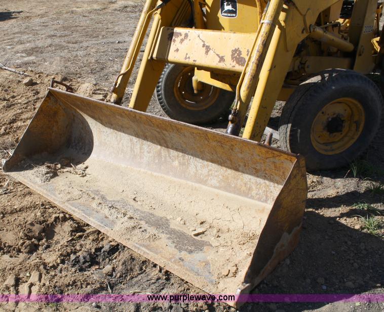 image for item 4706 1981 John Deere 302A tractor with loader