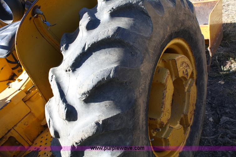 image for item 4706 1981 John Deere 302A tractor with loader