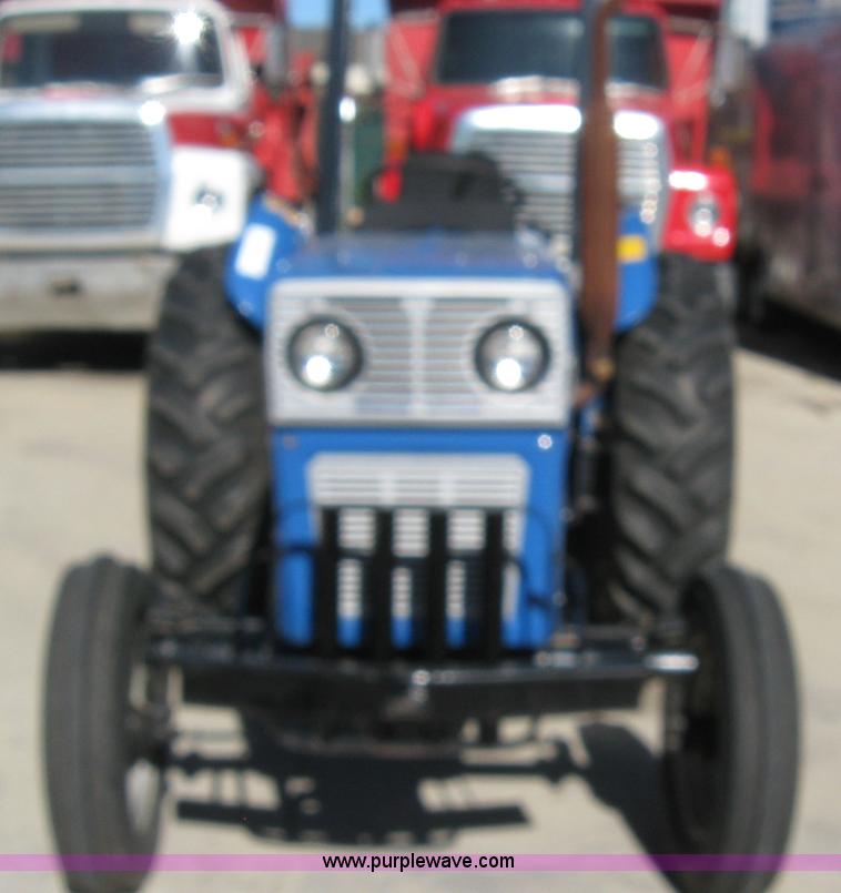 image for item 5595 Long 1563 tractor with mower