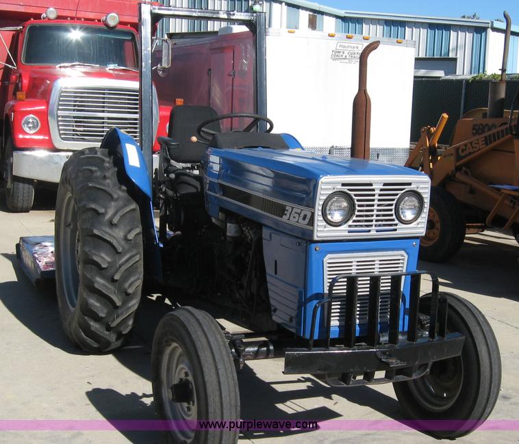 image for item 5595 Long 1563 tractor with mower
