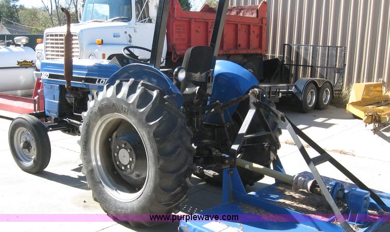 image for item 5595 Long 1563 tractor with mower