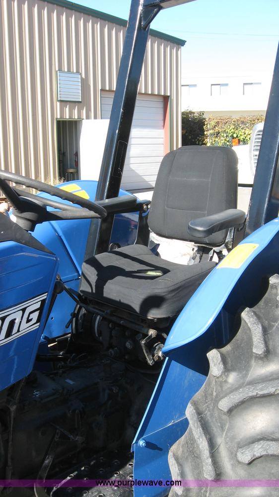 image for item 5595 Long 1563 tractor with mower