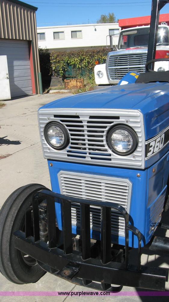 image for item 5595 Long 1563 tractor with mower