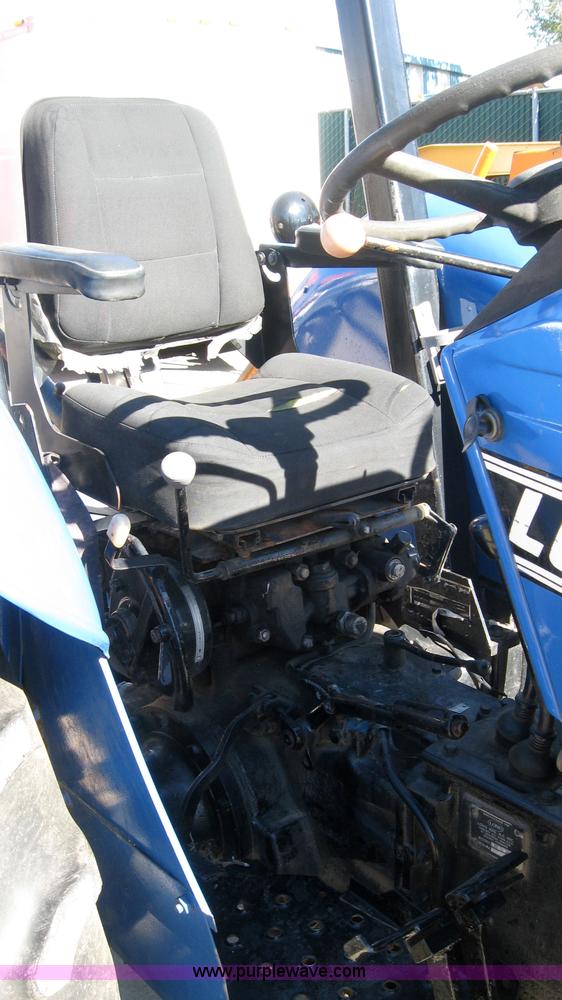 image for item 5595 Long 1563 tractor with mower