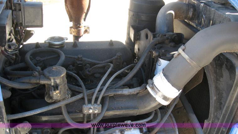 image for item 5595 Long 1563 tractor with mower