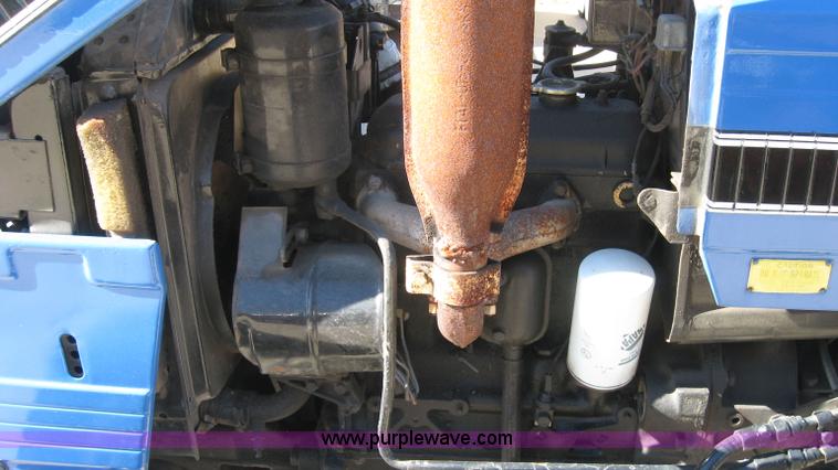 image for item 5595 Long 1563 tractor with mower