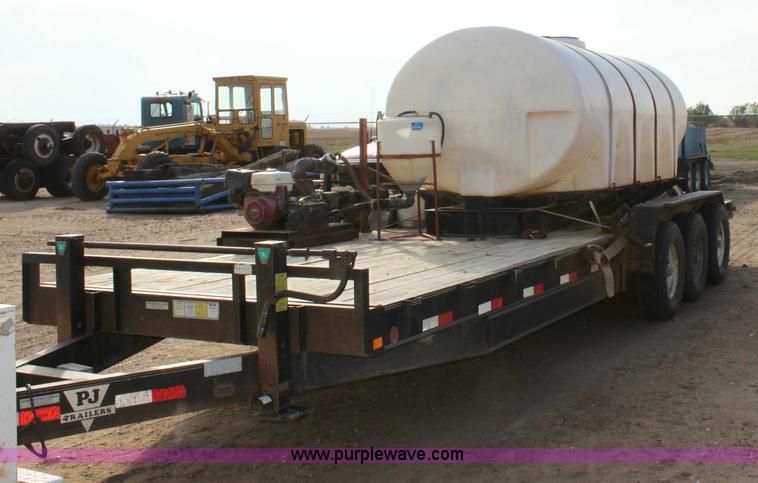 image for item 6268 2004 PJ 26' triple axle flatbed trailer