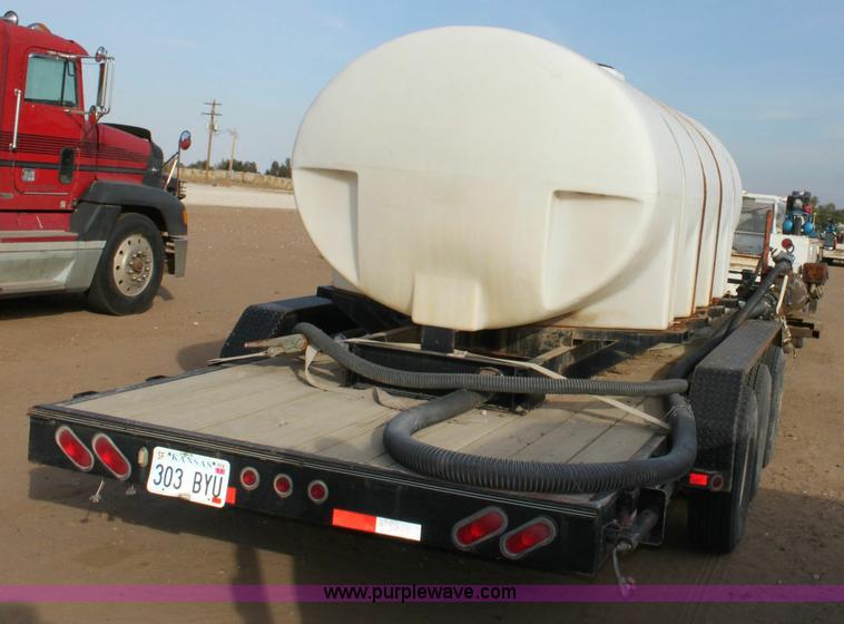 image for item 6268 2004 PJ 26' triple axle flatbed trailer