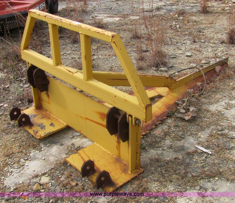 Rigid tree saw skid steer attachment in Winfield, KS Item 6656 sold Purple Wave