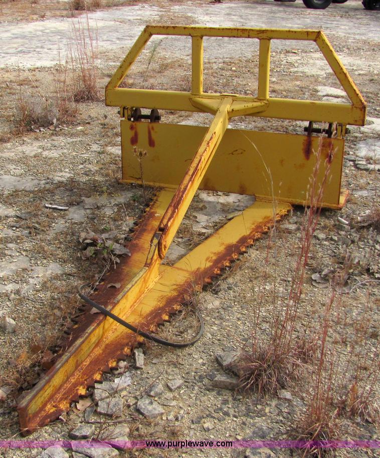 Rigid tree saw skid steer attachment in Winfield, KS Item 6656 sold