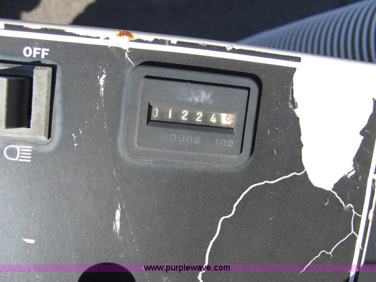 image for item 2305 Grasshopper 718 riding mower with bagger