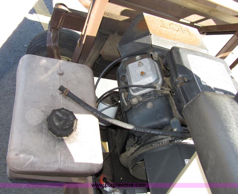 image for item 2305 Grasshopper 718 riding mower with bagger