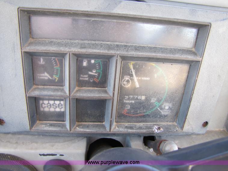 image for item 3563 1984 Case M1394 tractor with blade