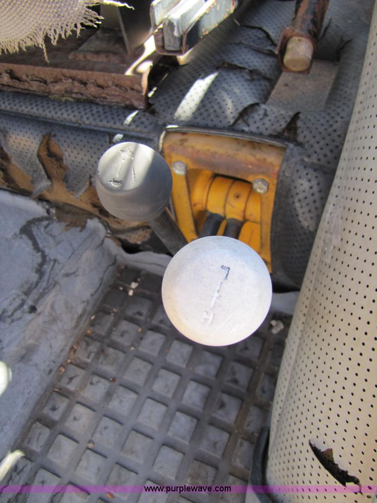 image for item 3563 1984 Case M1394 tractor with blade