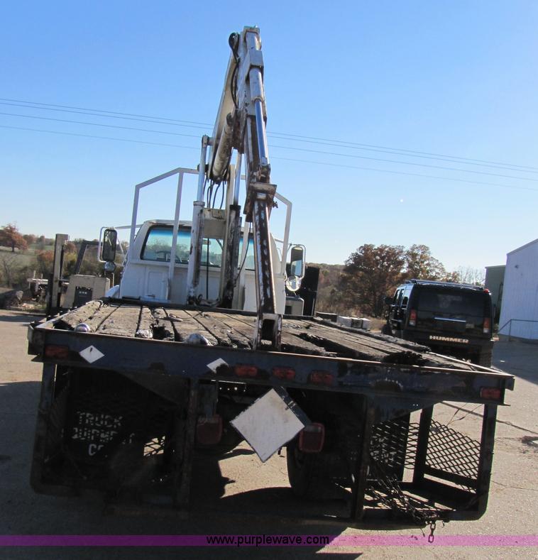 image for item 3570 1990 Ford F700 boom truck