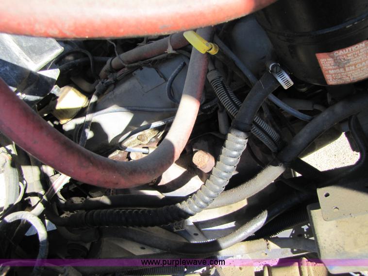 image for item 3570 1990 Ford F700 boom truck