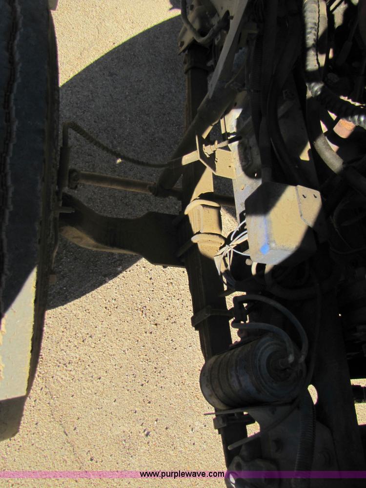 image for item 3570 1990 Ford F700 boom truck