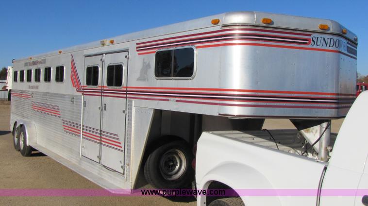 image for item 3580 1991 Sundowner 36' aluminum horse trailer