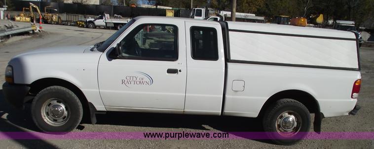 image for item 5543 1998 Ford Ranger extended cab pickup truck with topper