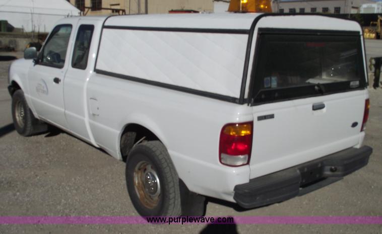image for item 5543 1998 Ford Ranger extended cab pickup truck with topper