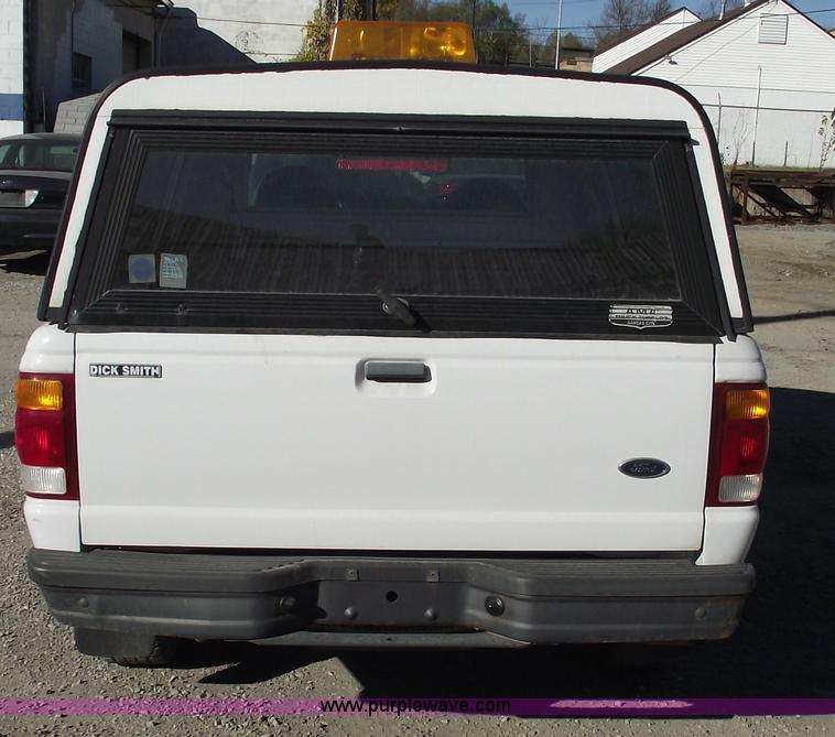 image for item 5543 1998 Ford Ranger extended cab pickup truck with topper