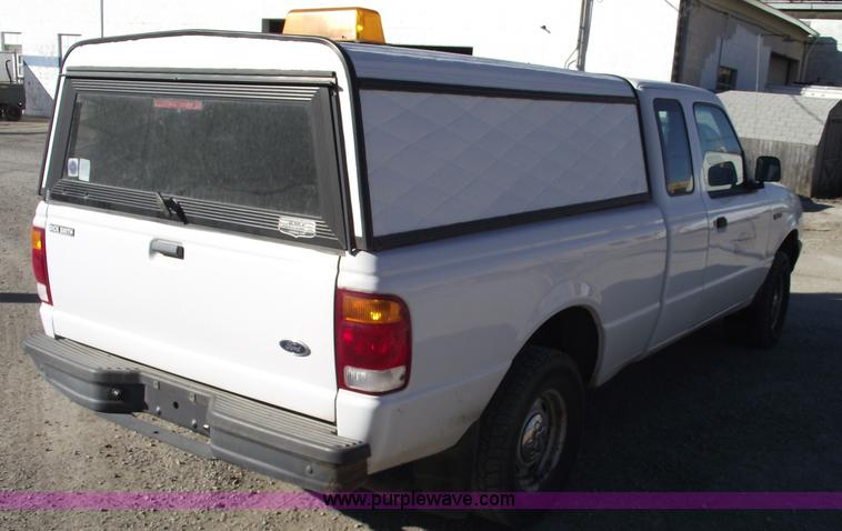 image for item 5543 1998 Ford Ranger extended cab pickup truck with topper
