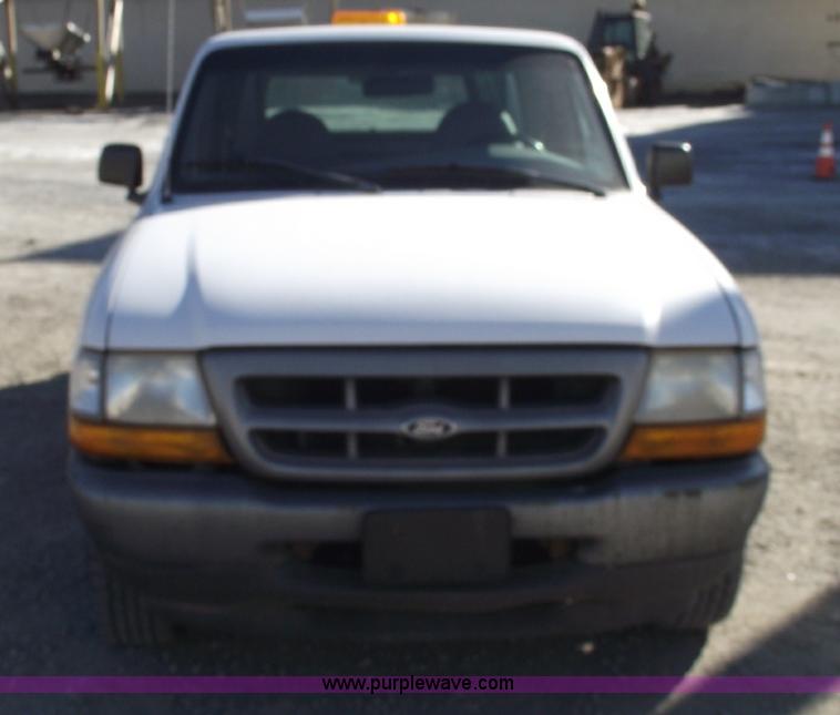 image for item 5543 1998 Ford Ranger extended cab pickup truck with topper