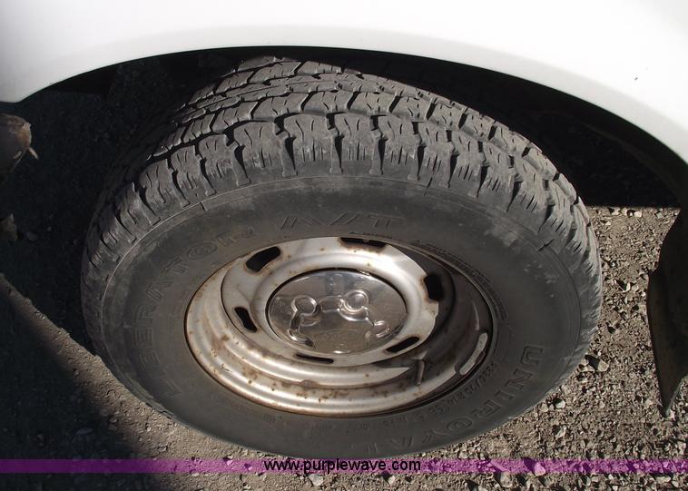 image for item 5543 1998 Ford Ranger extended cab pickup truck with topper