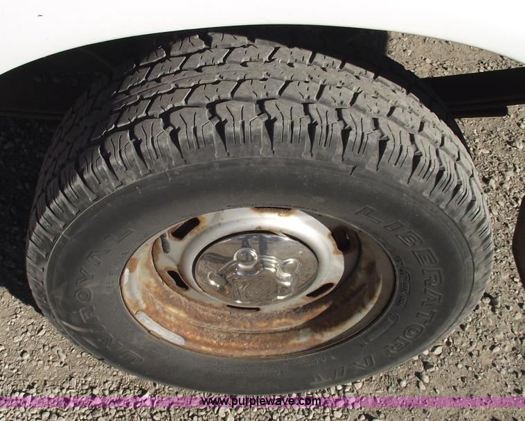 image for item 5543 1998 Ford Ranger extended cab pickup truck with topper