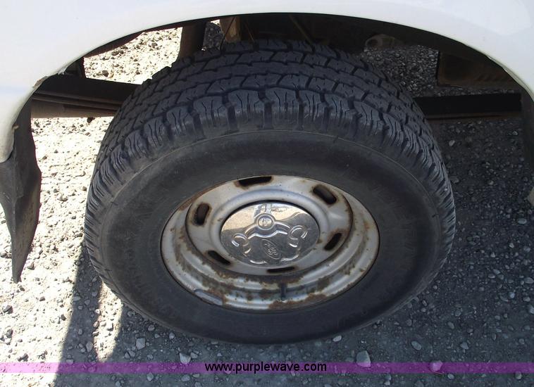 image for item 5543 1998 Ford Ranger extended cab pickup truck with topper