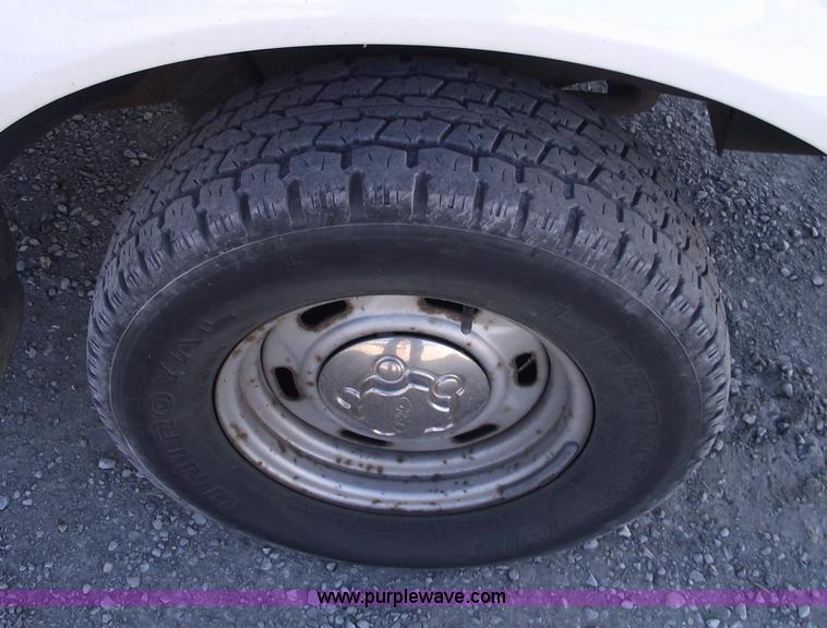 image for item 5543 1998 Ford Ranger extended cab pickup truck with topper