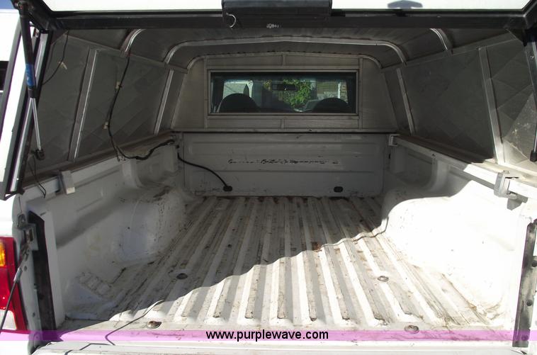 image for item 5543 1998 Ford Ranger extended cab pickup truck with topper