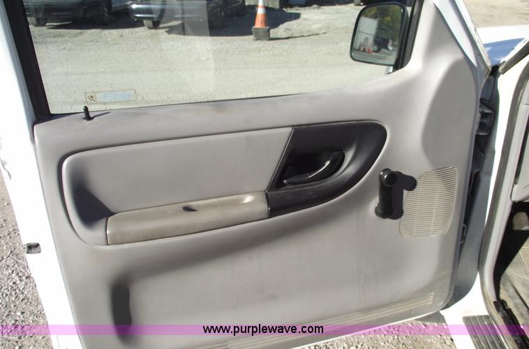 image for item 5543 1998 Ford Ranger extended cab pickup truck with topper