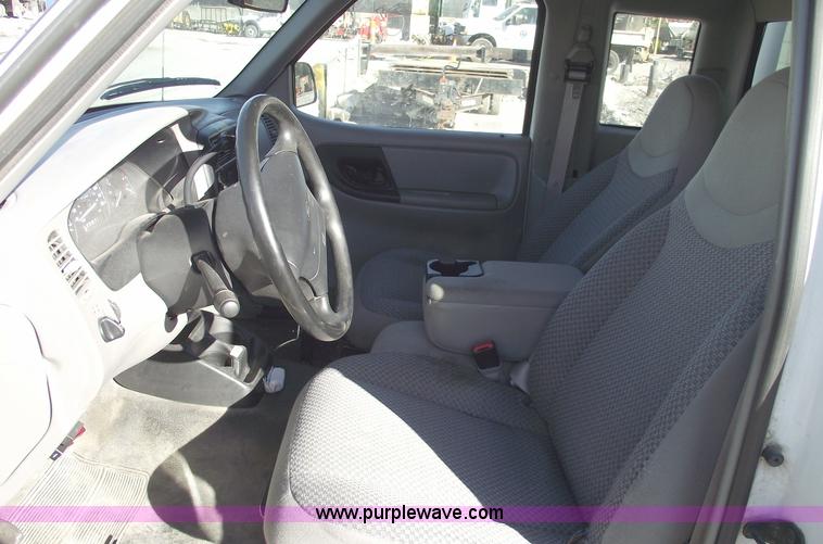 image for item 5543 1998 Ford Ranger extended cab pickup truck with topper